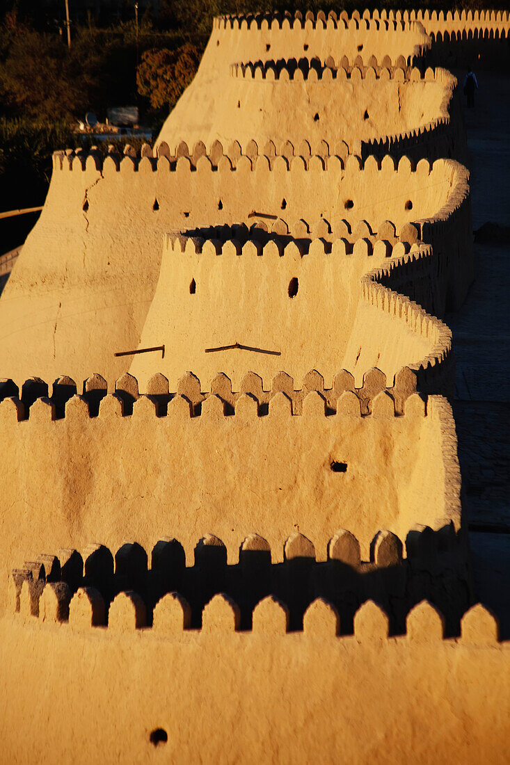 'Western walls at sunset, Ichan Kala Old City, Khiva, Kizilkum desert; Khwarezm region, Uzbekistan'