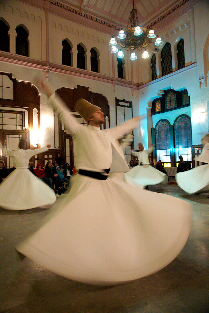 Performance By Whirling Dervishes Of The Galata Mevlevi Lodge At Sirkeci Station Waiting Room, Sultanahmet, Istanbul, Turkey. (C) Marc Jackson/Axiom