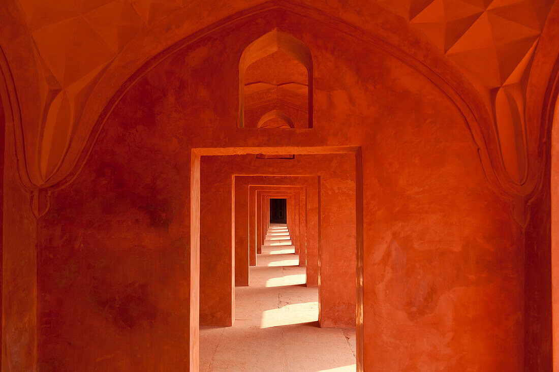 Corridor of sandstone in buildings beside the Taj Mahal, Agra, India.