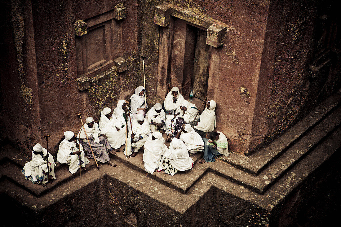 'Pilgrims at the preserved rock-hewn Church of Saint George, or Bete Giyorgis; Lalibela, Ethiopia'