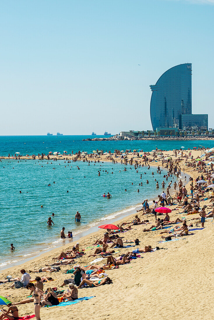 'A crowd on Barceloneta beach; Barcelona, Catalonia, Spain'