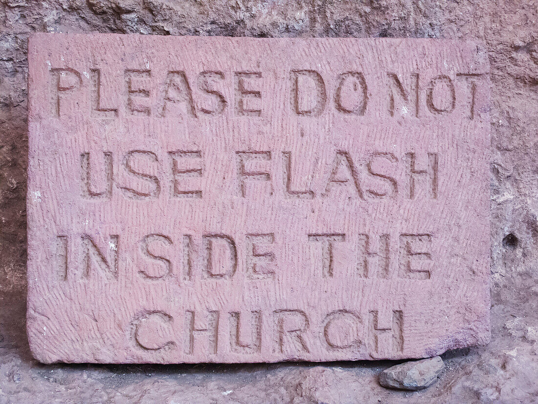 'A sign prohibiting the use of a camera flash inside the church, Beit Maryam rock-cut church; Lalibela, Amhara region, Ethiopia'