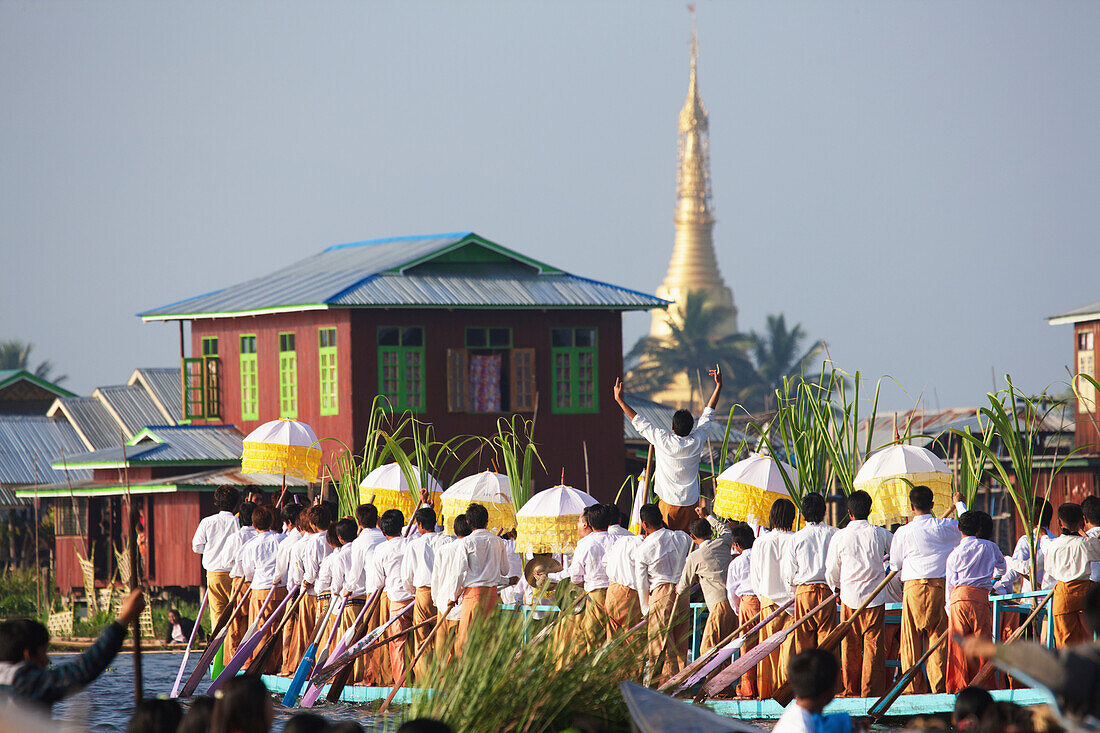 'Leg rowing procession on Inle Lake; Myanmar'