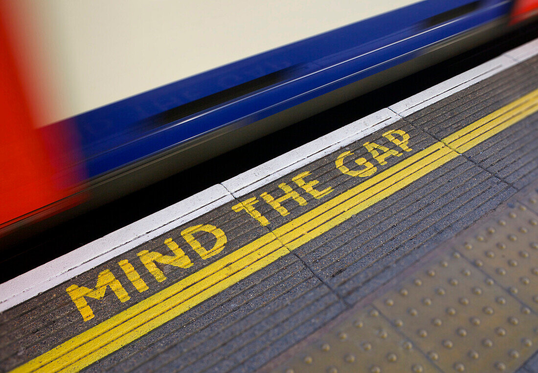 MIND THE GAP sign on platform edge, London Underground, London, England, United Kingdom, Europe