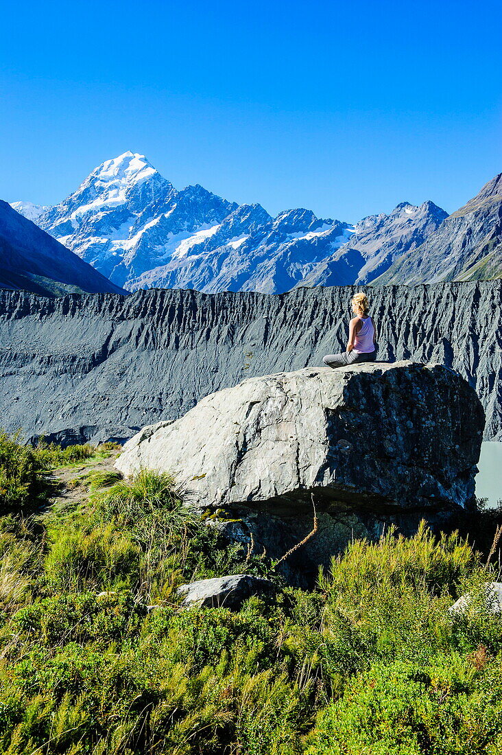 Woman enjoying the view of Mount Cook, UNESCO World Heritage Site, South Island, New Zealand, Pacific