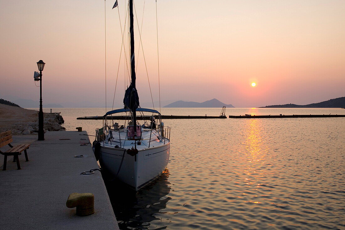 View across the harbour at sunrise, Frikes, Ithaca (Ithaki), Ionian Islands, Greece