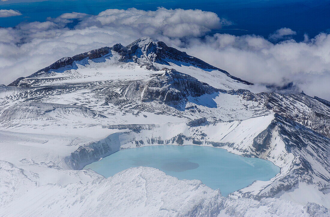 Aerial of a tuquoise crater lake on top of Mount Ruapehu, Tongariro National Park, UNESCO World Heritage Site, North Island, New Zealand, Pacific