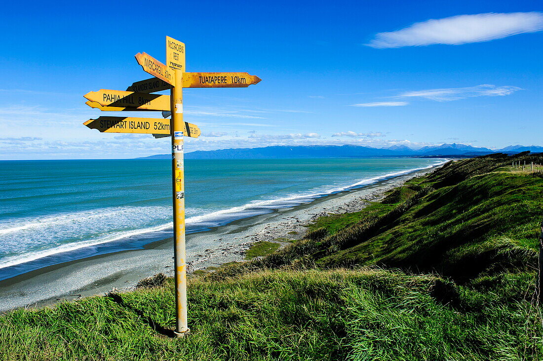 Signpost on Te Waewae Bay, along the road from Invercargill to Te Anau, South Island, New Zealand, Pacific