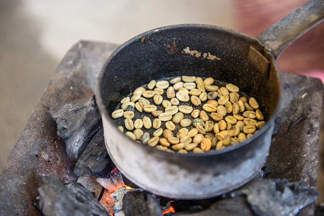 Roasting coffee beans, Keren, Eritrea, Africa