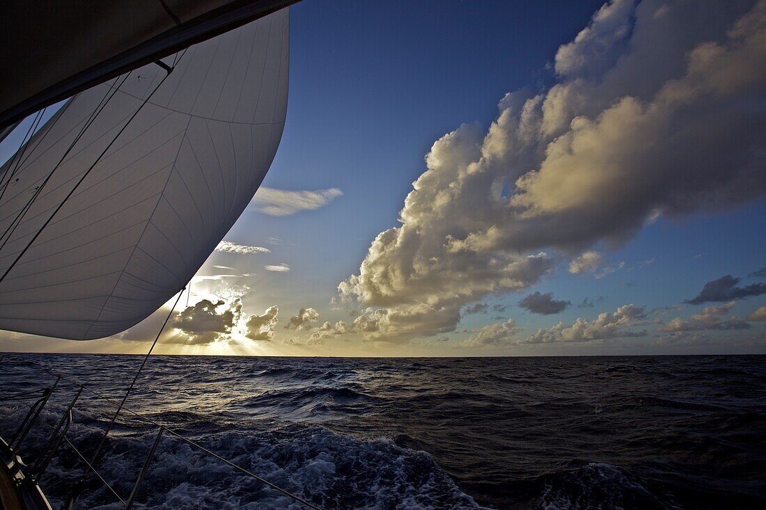 Sailing boat, yacht on the Atlantic ocean with trade wind clouds, Sailing