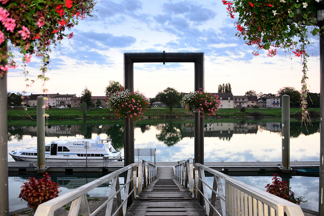 Tournus on the banks of the river Saone with reflection, Saon-et-Loire, Burgundy, France