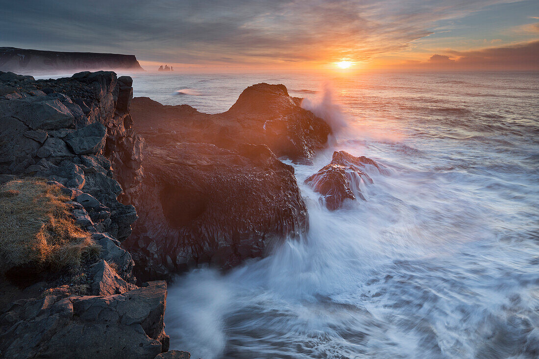 Rocky coastline near Dyrholaey, South Island, Island