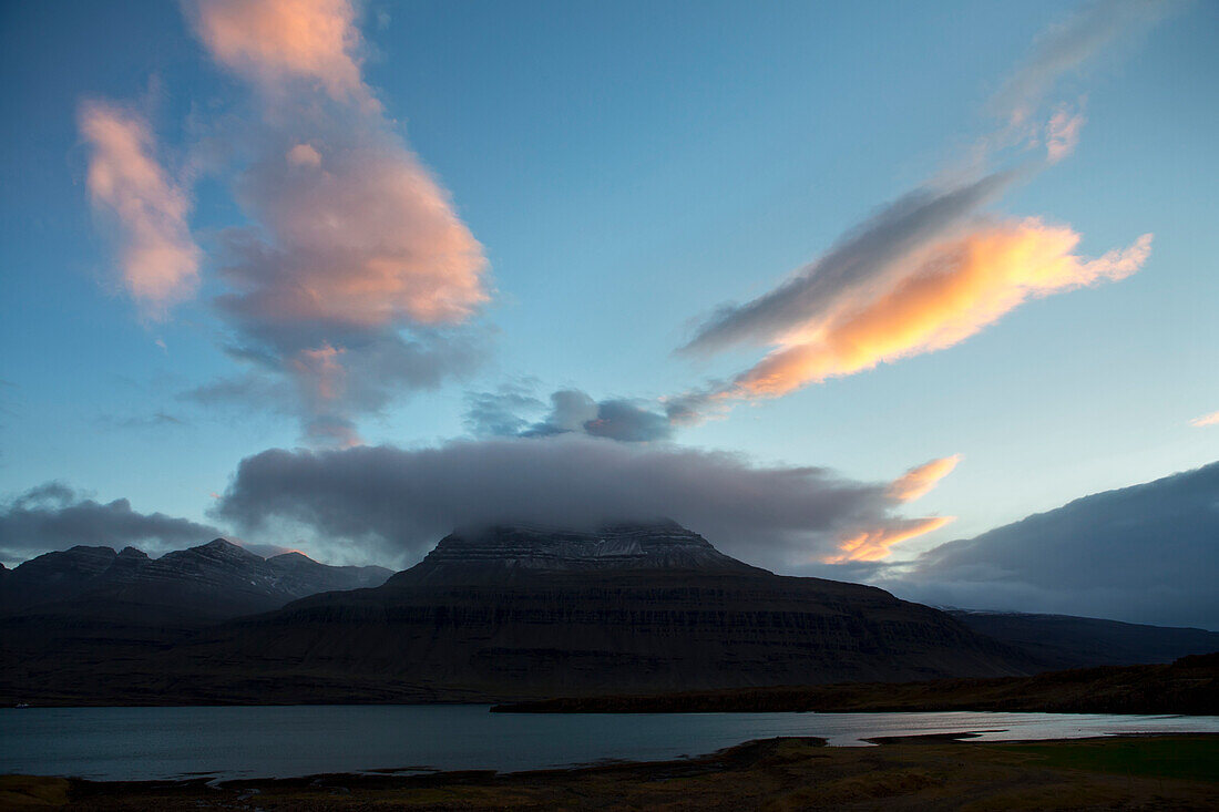 'Cloud cover over a mountain at sunset; Iceland'