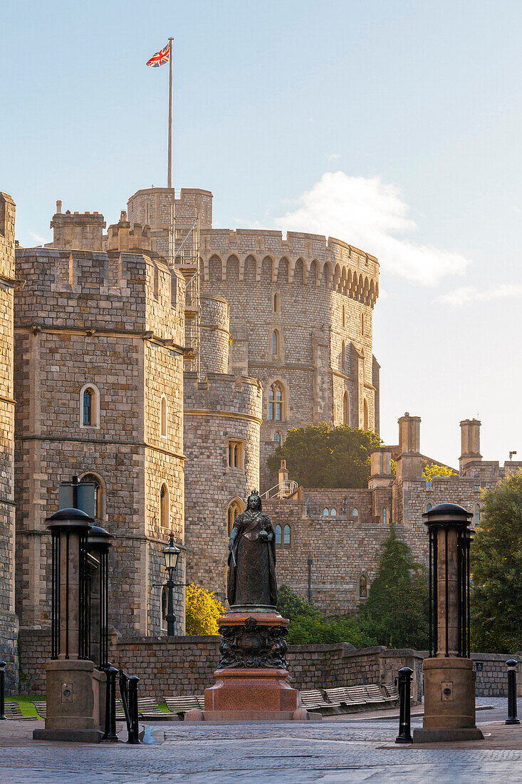 Windsor Castle and statue of Queen Victoria at sunrise, Windsor, Berkshire, England, United Kingdom, Europe