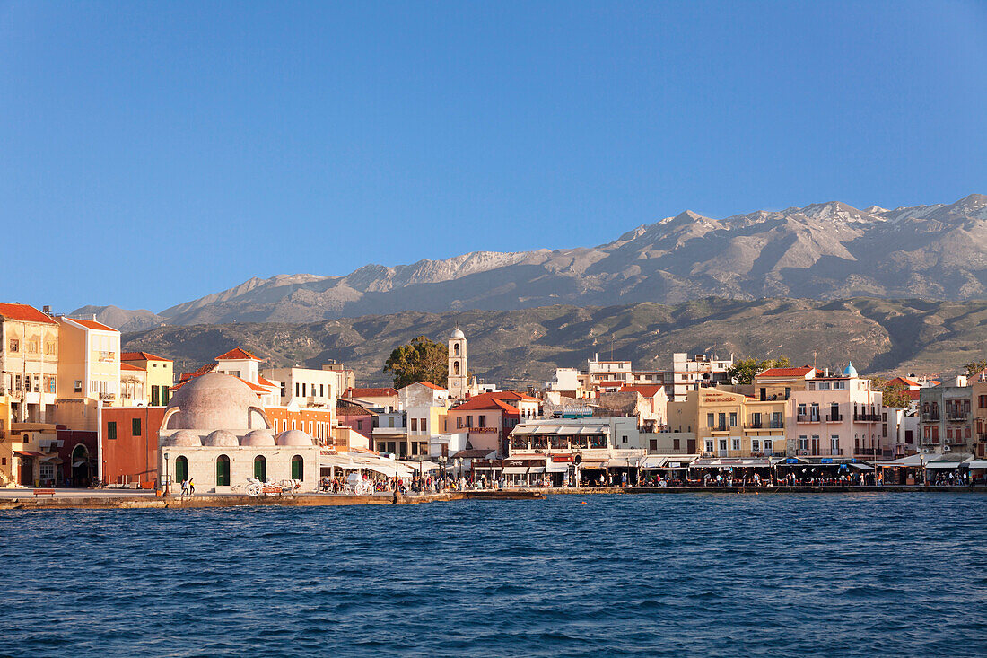 Venetian port and Turkish Mosque Hassan Pascha in front of Lefka Ori Mountains (White Mountains), Chania, Crete, Greek Islands, Greece, Europe