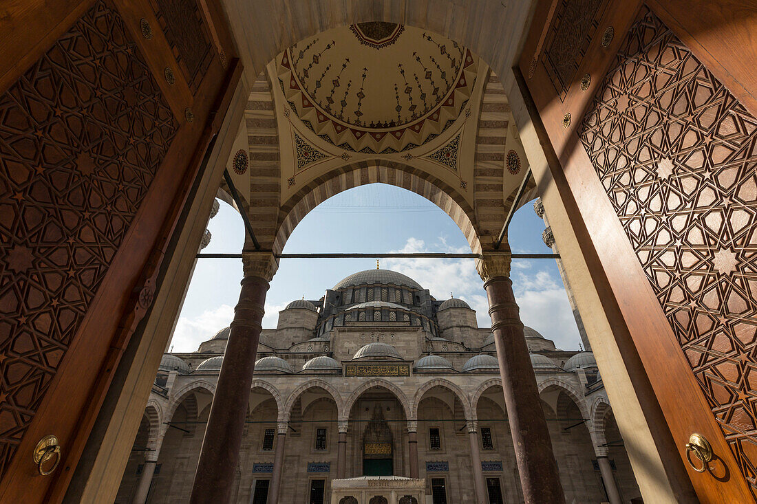Ornate wooden doors, Courtyard entrance, early morning, Suleymaniye Mosque, Bazaar District, Istanbul, Turkey, Europe
