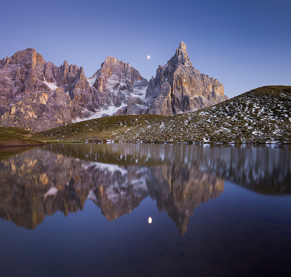 Cima Bureloni (3130m), Cima della Vezzana (3192m), Cimon della Pala (3184m), during moonrise with reflection in a mountain lake, Laghetto di Baita Segantini, Passo Rolle, Trentino, Alto Adige, Dolomites, Italy