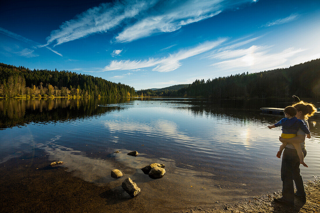 sunset, Reflection of the sky in the Windgfaellweiher, near lake Titisee, Black Forest, Baden-Wuerttemberg, Germany