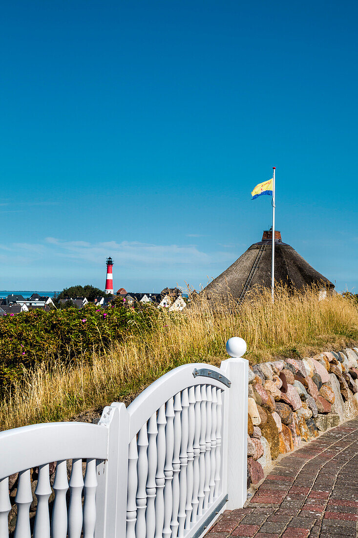 Thatched houses and lighthouse, Hoernum, Sylt Island, North Frisian Islands, Schleswig-Holstein, Germany