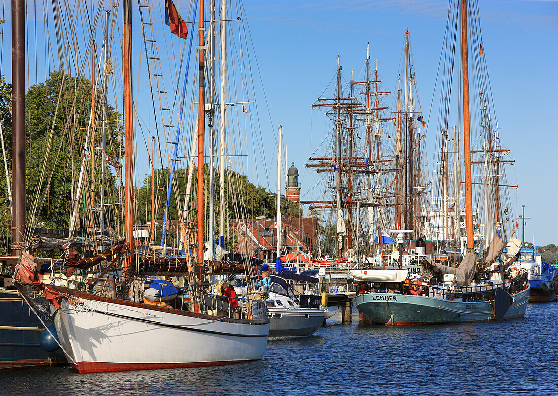 Kiel week, Sailing boats at the lighthouse at Kiel Holtenau, Kiel, Baltic Sea Coast, Schleswig Holstein, Germany