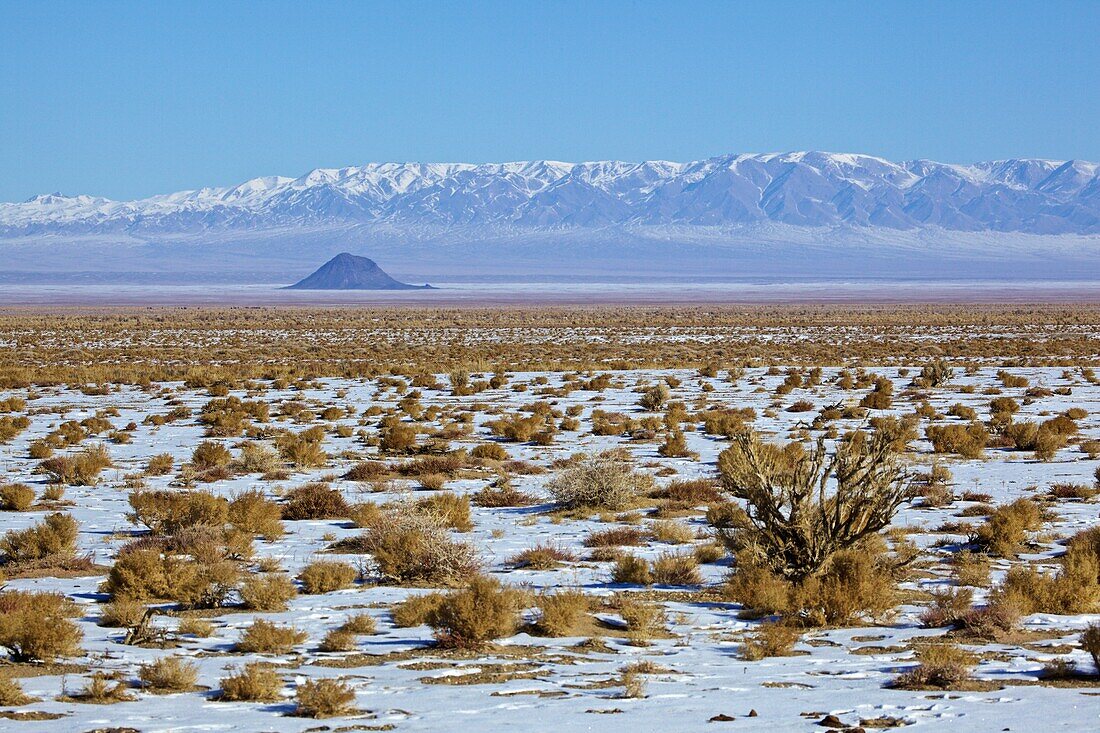 Volcanic cone in front of the Tarbagatai Mountains, Mongolia