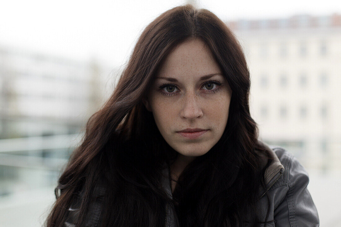 Young woman looking at camera, Munich, Bavaria, Germany