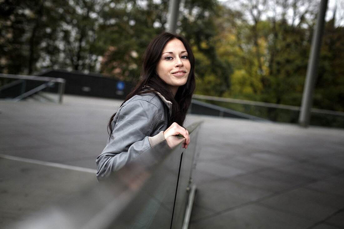 Young woman looking at camera, Munich, Bavaria, Germany
