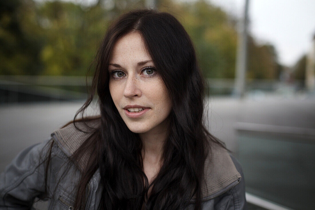 Young woman looking at camera, Munich, Bavaria, Germany