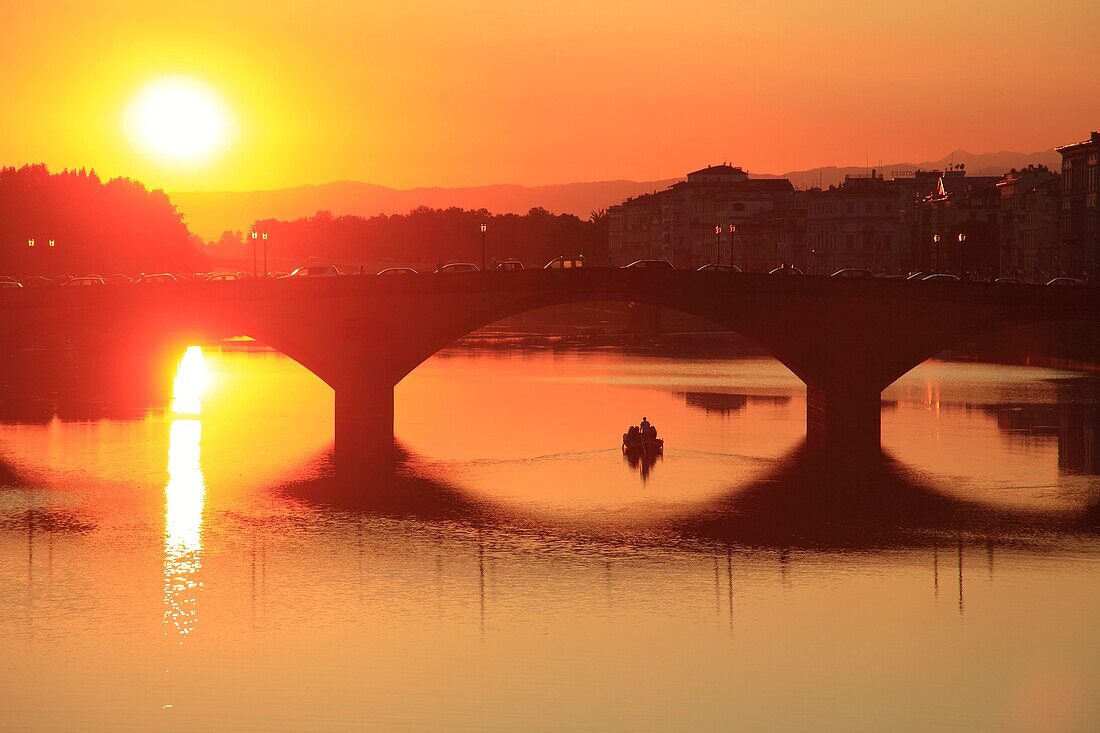 Ponte alle Grazie over Arno river at sunset, Florence, Tuscany, Italy