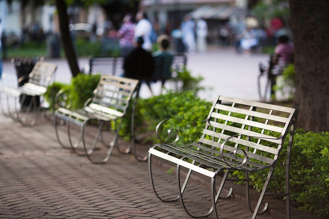 Dominican Republic, Santo Domingo, Zona Colonial, Parque Colon park, dusk