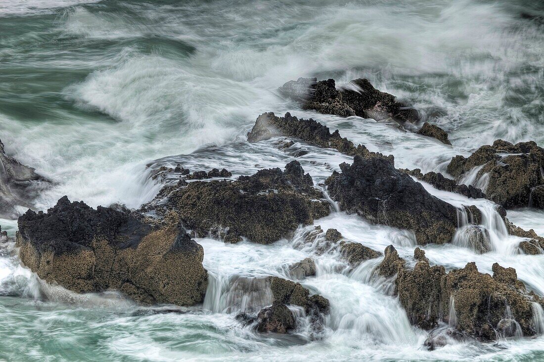 Surf breaking over rocks, Tumbledown Bay, Banks Peninsula, Canterbury, New Zealand