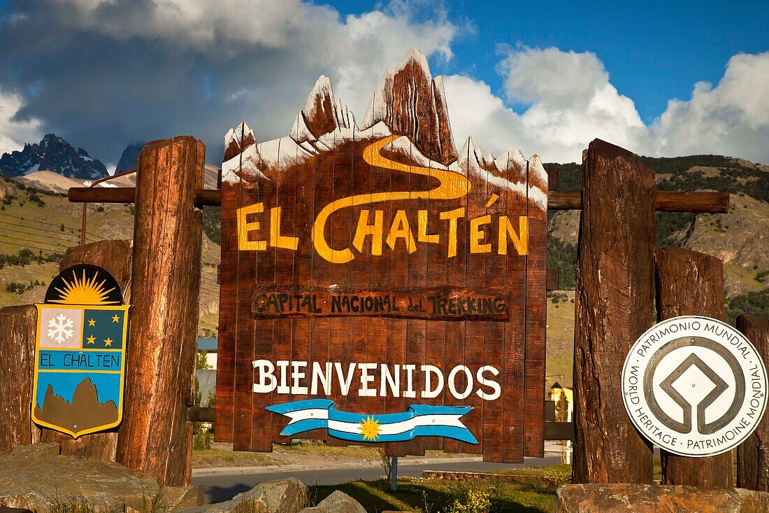 El Chalten village welcome sign, with shape of famous peak FitzRoy, Parque Nacional Los Glaciares, Patagonia, Argentina.