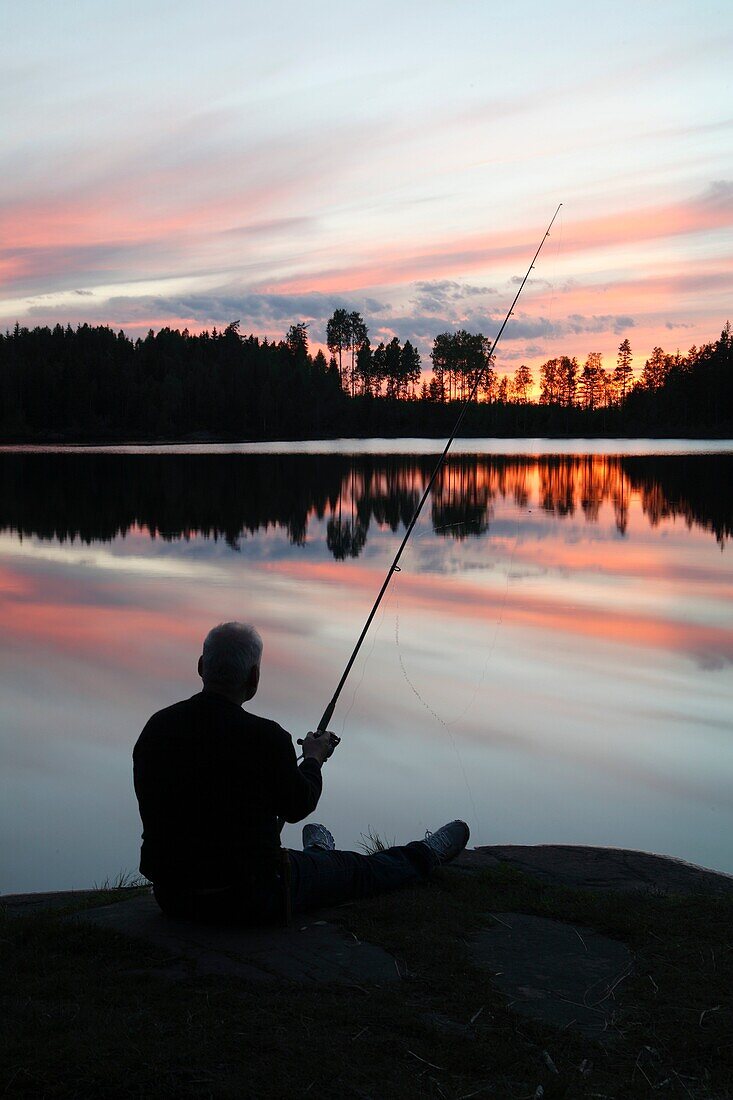 Man fishing  Värmland Sweden.