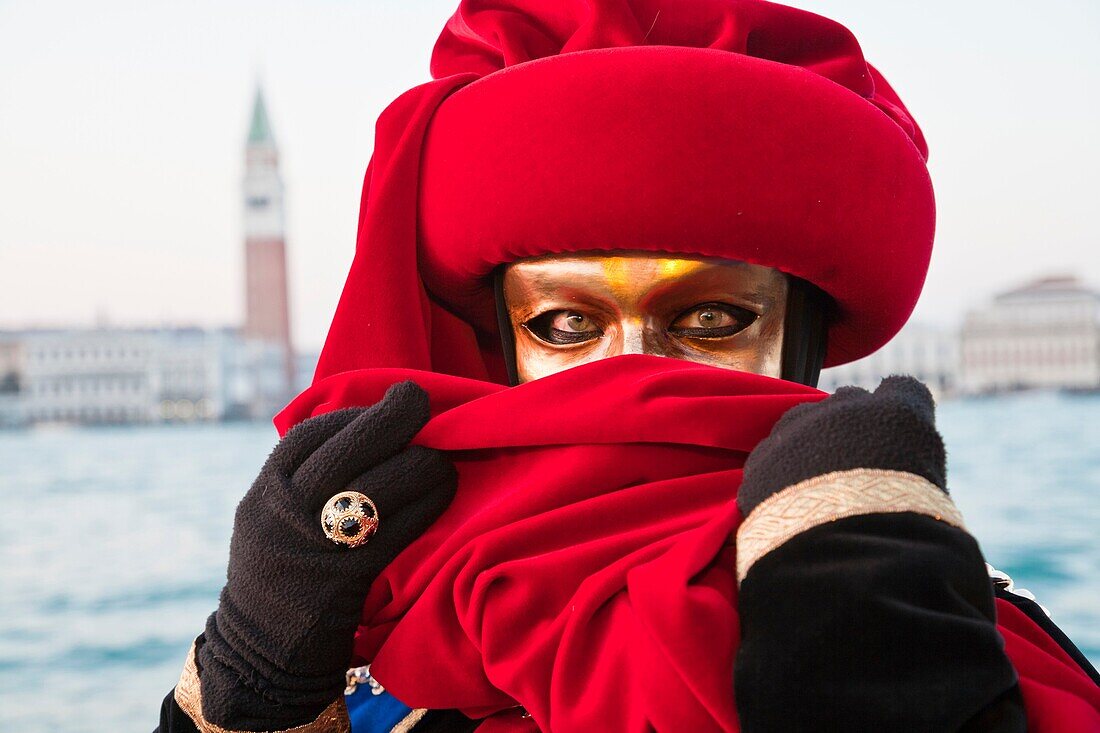 A masked woman at the carnival in Venice, Italy, Europe