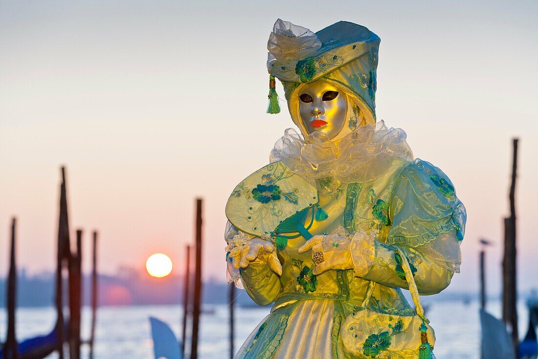 A masked woman at the carnival in Venice, Italy, Europe