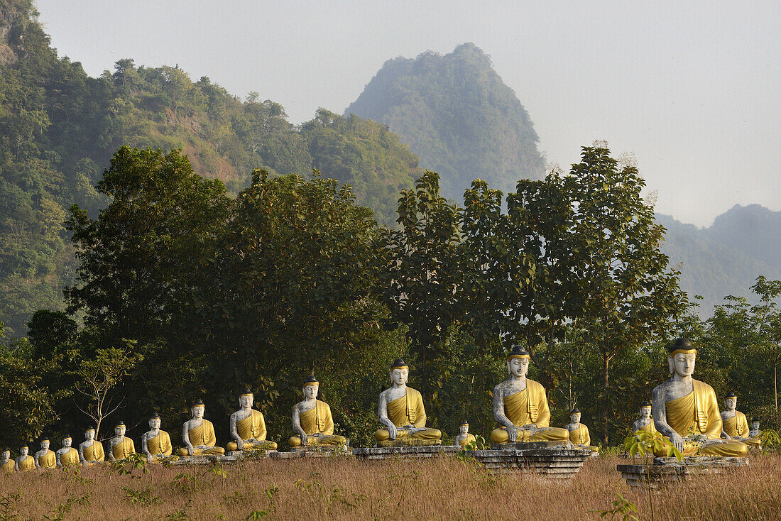 Myanmar, Kayin (Karen) State, Hpa-An, Lumbini park, Buddha statues.