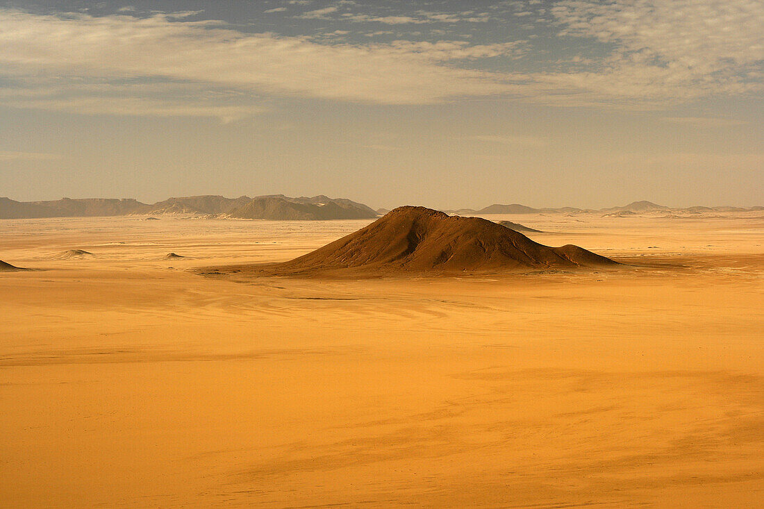 Desolate landscape in Oued Tin Tarabine. Tassili Ahaggar. Sahara desert. Algeria.