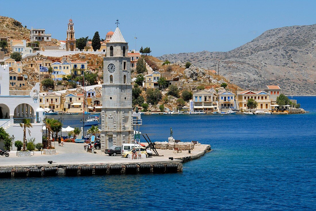 The Harbour clock tower Gialos Yialos city of Symi Greece
