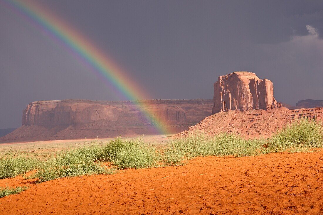 Rainbows end in Monument Valley, Navajo Nation, USA