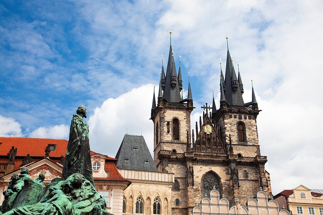 Jan Hus statue and Tyn Church Týnský chrám Old Town Square, Prague Czech Republic