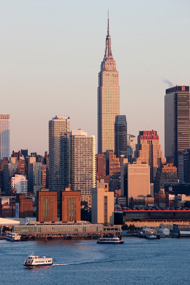 The Empire State Building and Manhattan skyline on the west side of Manhattan, New York City, New York, USA as seen from Weehawken, New Jersey