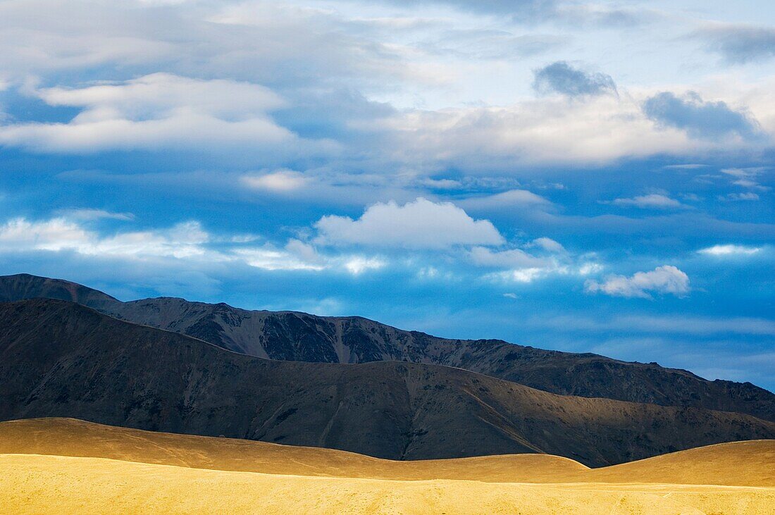 Dramatic light over mountains at Lake Takepo, New Zealand