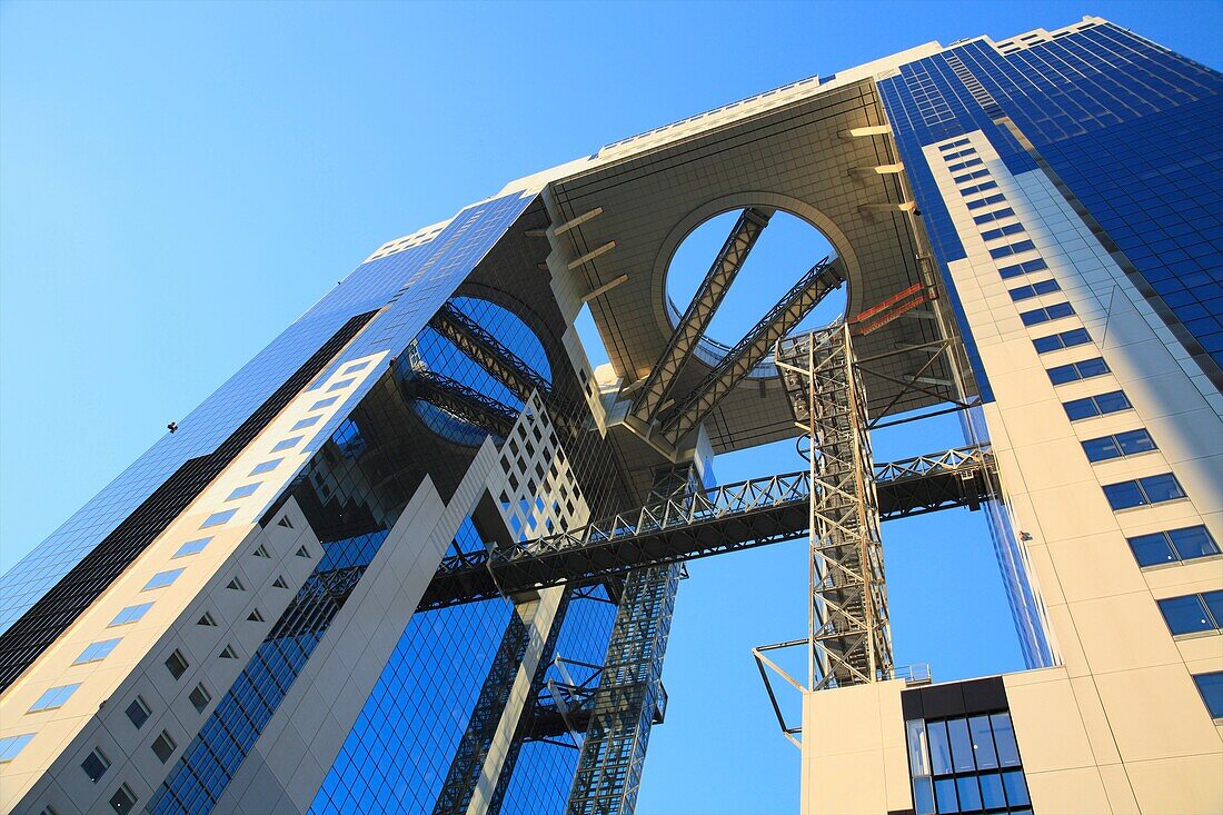 Umeda Sky Building, Osaka, Japan  The 173 meter tall building consists of two main towers which are connected with each other by the Floating Garden Observatory on the 39th floor