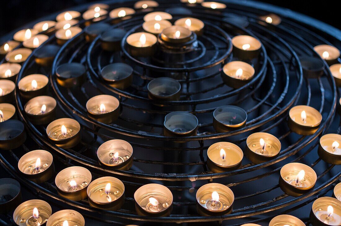 Candles in Notre Dame de Paris Chruch, France.