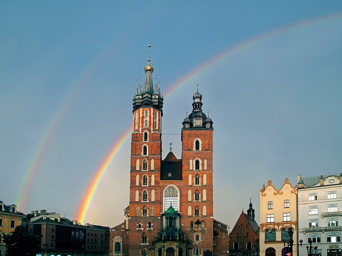 Rainbow over Mary the Virgin Basilica at Main Market Square, Krakow, Poland, Europe