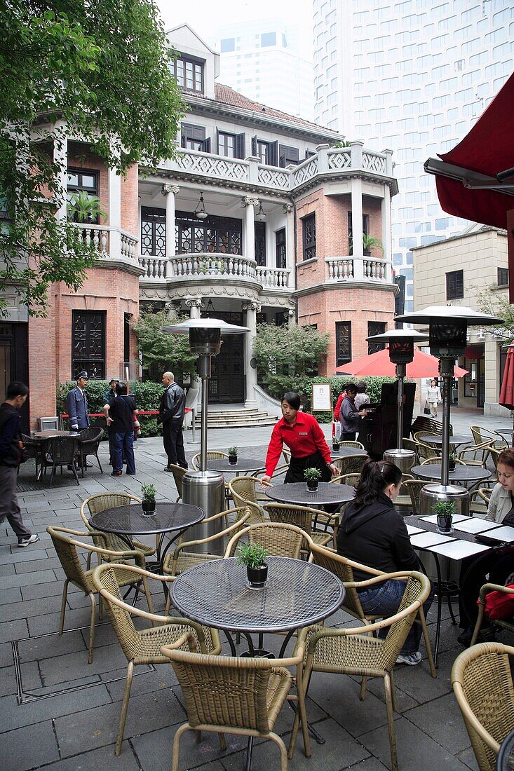 China, Shanghai, Xintiandi leisure area, restored historic architecture.