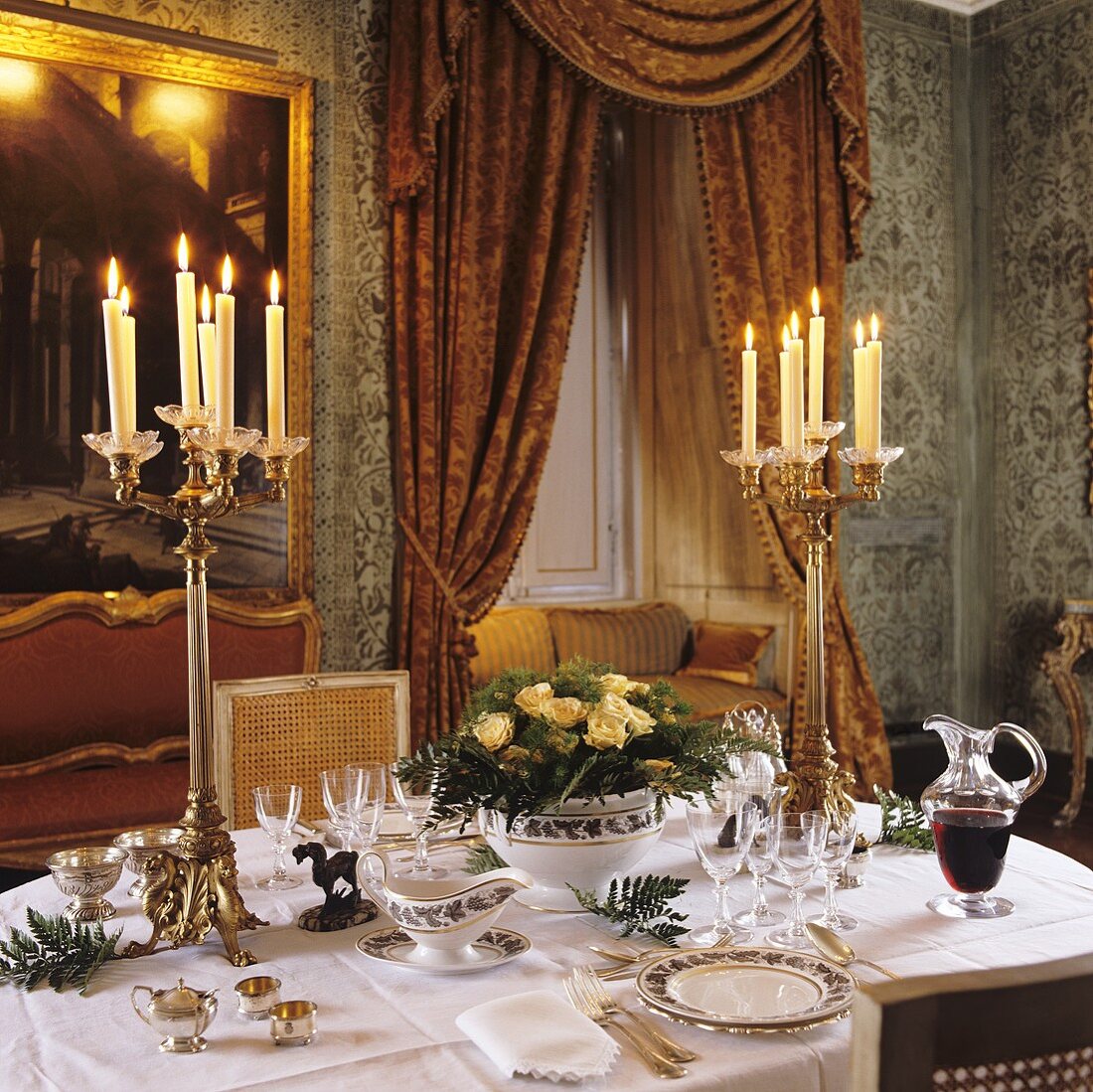 A romantic atmosphere in a palazzo - a festive table set for two