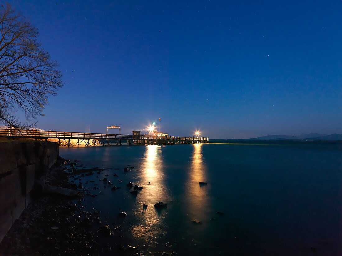 Shipping pier at night, Fraueninsel, lake Chiemsee, Bavaria, Germany