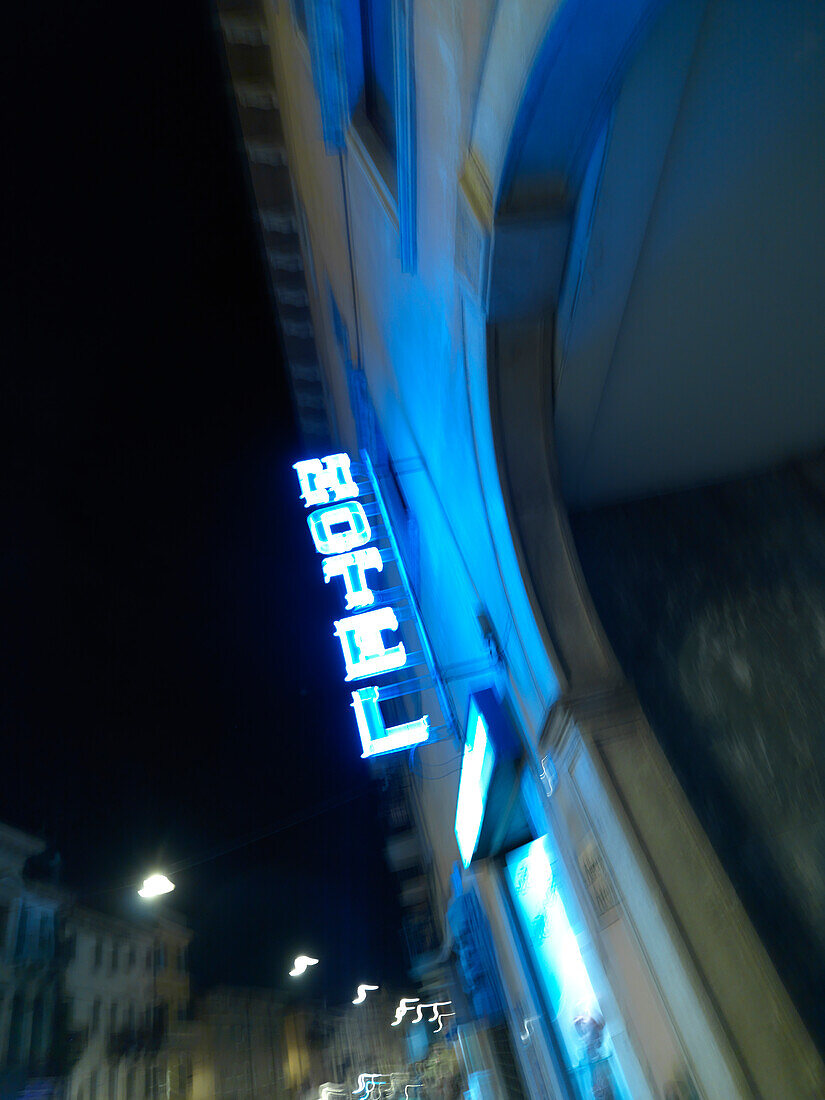 Fluorescent hotel sign, Verona, Veneto, Italy