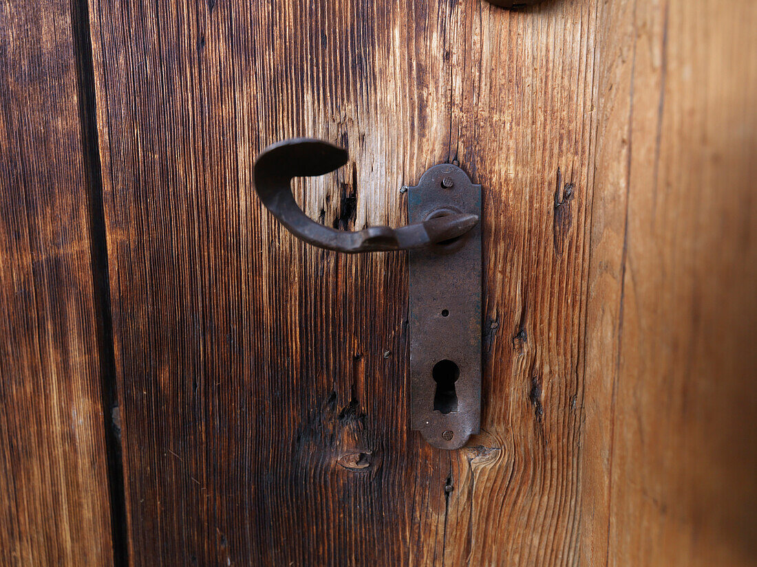 Close-up of a doorhandle, mountain hut Kallbrunn Alp, Lofer, Salzburger Land, Austria